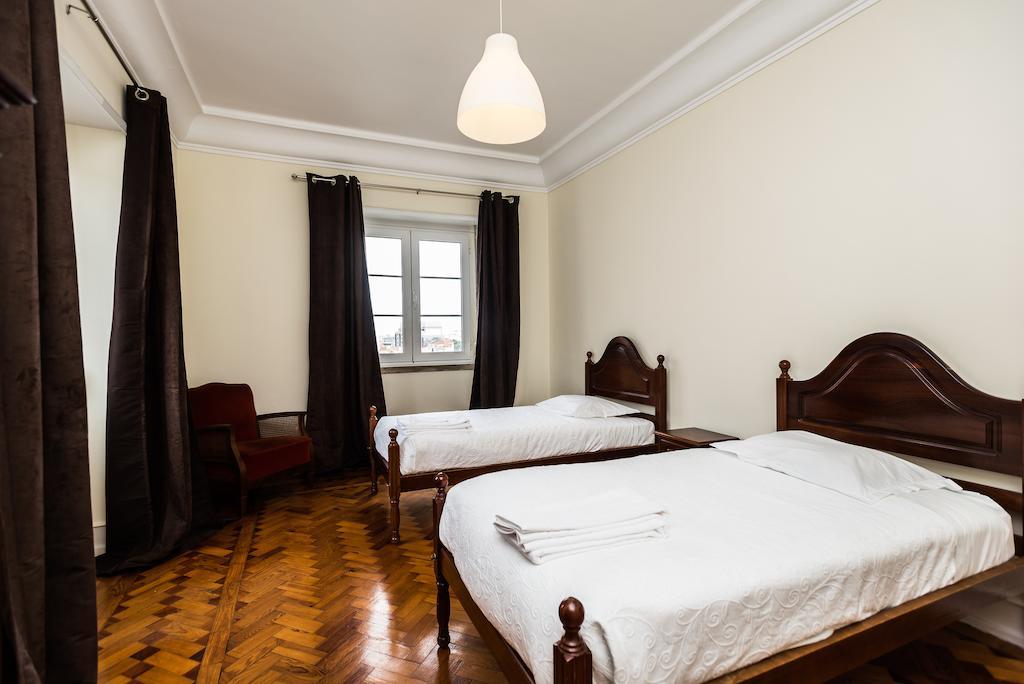 Apartamentos Lux Dinastia Lisboa Habitación foto